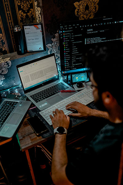 Cybersecurity professional managing a secure network dashboard.